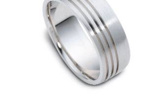 14k white gold comfort fit wedding band with the hammered finish center  and high polish finish on both sides.