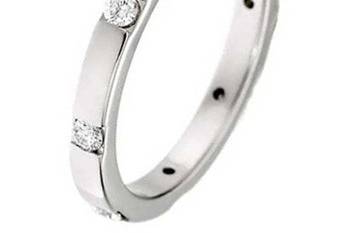 14k white gold wedding band with a satin finish that is divided by high polish finish creating a square pattern.