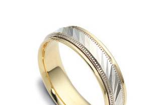 An amazingly hand crafted wedding band is designed to be comfort fit for the comfort of the wearer. This beauty is crafted in high quality yellow gold.