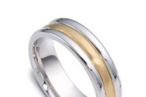 An amazingly hand crafted wedding band is designed to be comfort fit for the comfort of the wearer. This beauty is crafted in high quality rose, white, and yellow gold.
