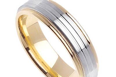 Fancy handmade wedding band with the center crafted in white gold diamond cut shiny finish , with milgrain on each side and the both side of ring is 14K yellow gold with shiny finish.