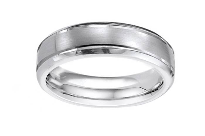 14k white gold wedding band with a satin finish that is devided by high polish finish creating a rectangular pattern.