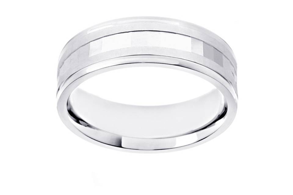This stunning wedding band has an alternating pattern of shiny vertical cuts and satin squares and completes it's look with shiny beveled edges. Crafted in 14k white gold. Any gentlemen would gladly wear this attractive wedding band. Available in any size and width.
