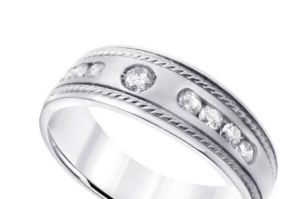 14k white gold wedding band with a satin finish that is devided by high polish finish creating a rectangular pattern.