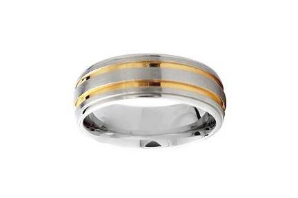 This 14k two tone wedding band has a unique look with fine etched lines cut all around the band with bright cut circles among them. Two high polish parallel cuts separate the center. This modern comfort fit, best seller has a very different look to it. available in any size and width.