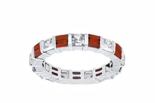 High quality, contemporary men's diamond ring set in a brushed finished 14k white gold setting with a vertical and horizontal bright cut lines which get intersected five by circular patterns evenly spread around the band with a round cut diamond set in each circle.  Total weight of diamonds approximately   0.10 carats