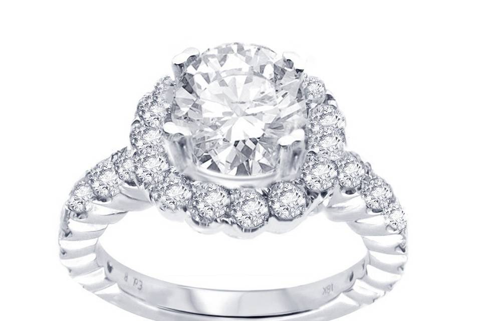 Three Stone Round Halo Engagement Ring features a matching pair of round diamonds all surrounded by halos encrusted with round diamonds that continue down to its's 14k white gold shank. Total weight of diamonds are approximately 1.00 carat.