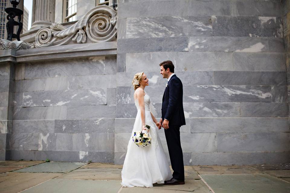 Couple portrait in front of stone building