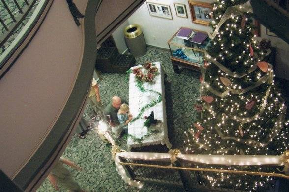 Guest Book table at bottom of stairs.