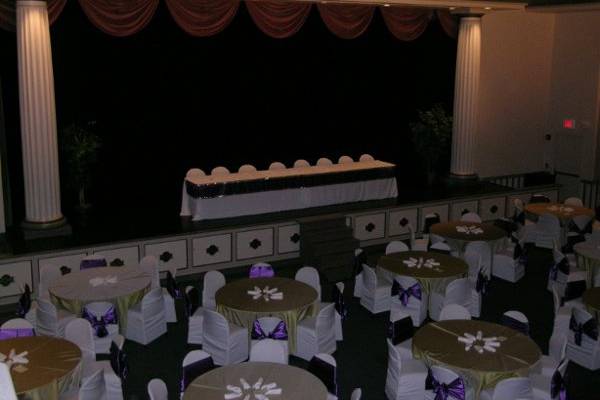 Theater set-up for reception. Head table on the stage.