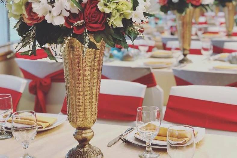 Gold vintage vase with silk flower arrangement