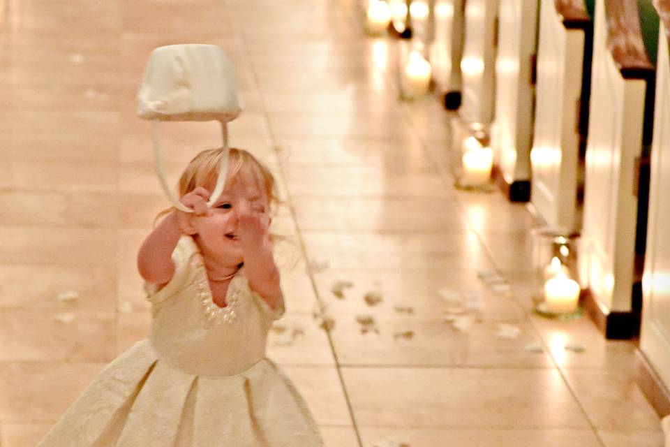 Flower girl tosses flowers