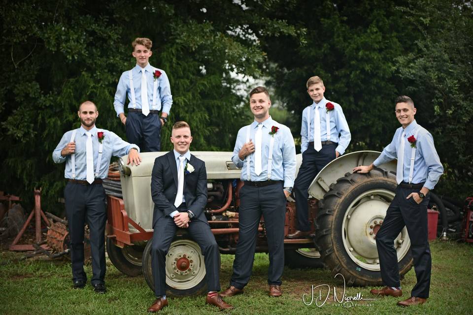 Groomsmen on old tractor