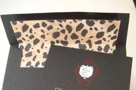 Old Hollywood themed invite with red suede band and leopard print envelope liner