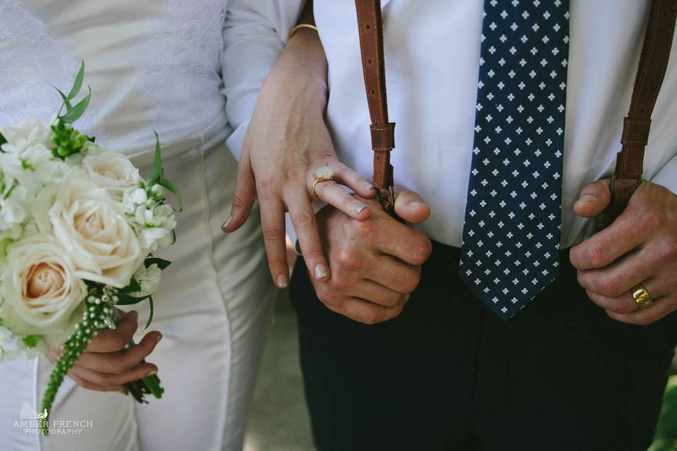 Floral design for this gorgeous seattle bride and groom including: bouquets, table centerpieces, floral crowns, rose pedals for the aisle and incredibly unique ground arbor adorations with northwest greens and flowers. Amber french photography