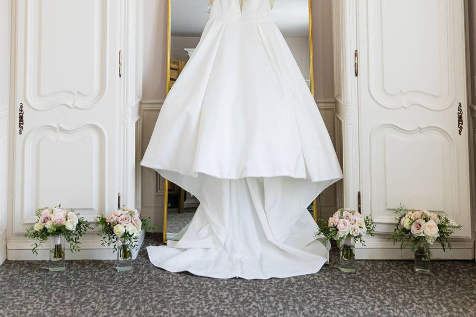 Bride's dress on elegant wall