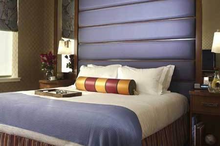 King Deluxe Guestroom at Monaco Baltimore, a AAA rated 4 Diamond Recipient, and named a World's Best Hotel by Conde Nast Traveler readers in 2011.