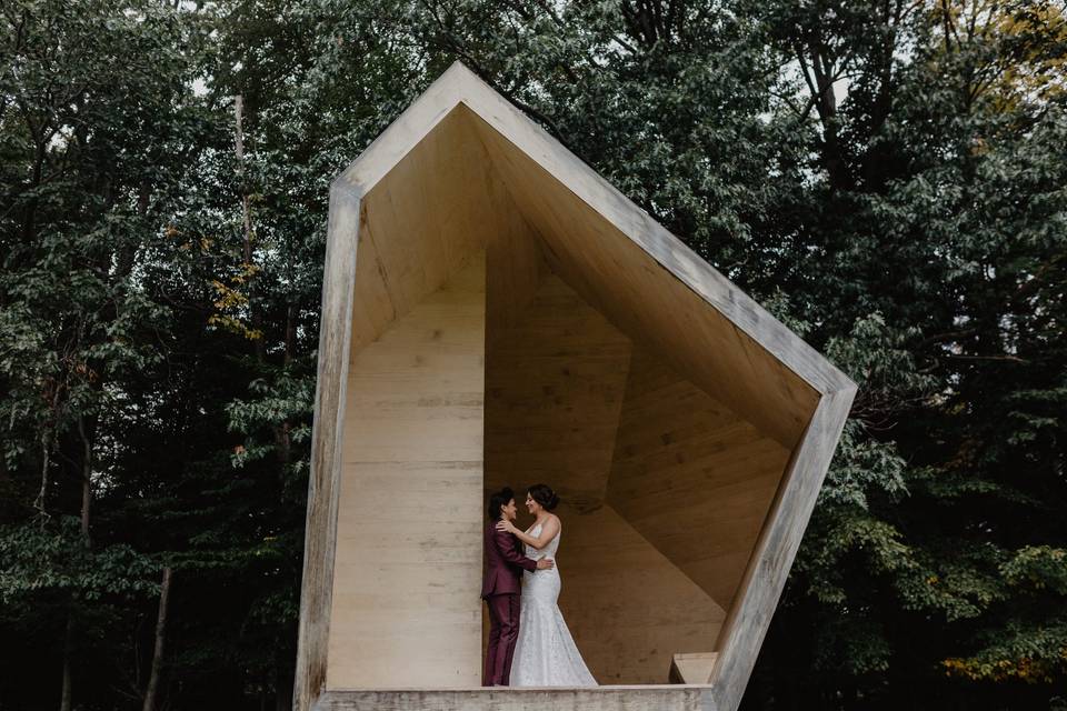 Couple posing in abstract structure