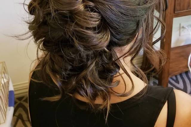 Curled half bun