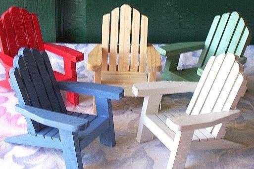 These cute mini wooden adirondack chairs make a cute addition to any event.  The mini adirondack chairs make great cake toppers