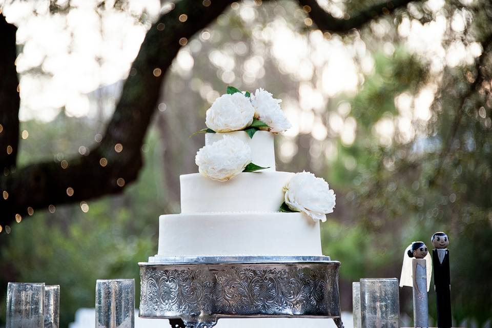 Cake with white peony flowers