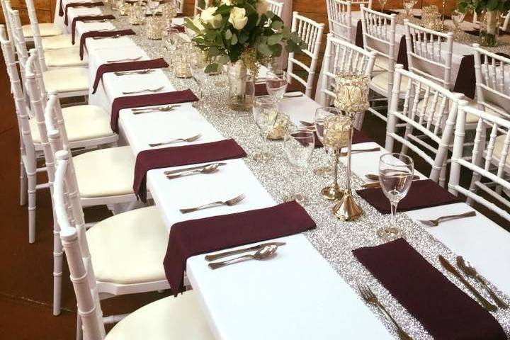 Padded Chiavari chairs and white linens