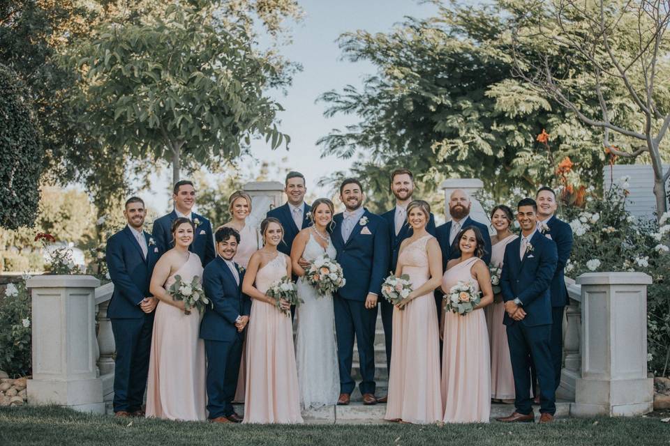 The wedding party poses