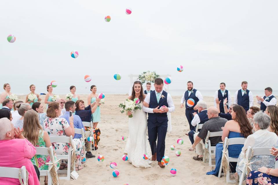 Happily wed couple on the beach