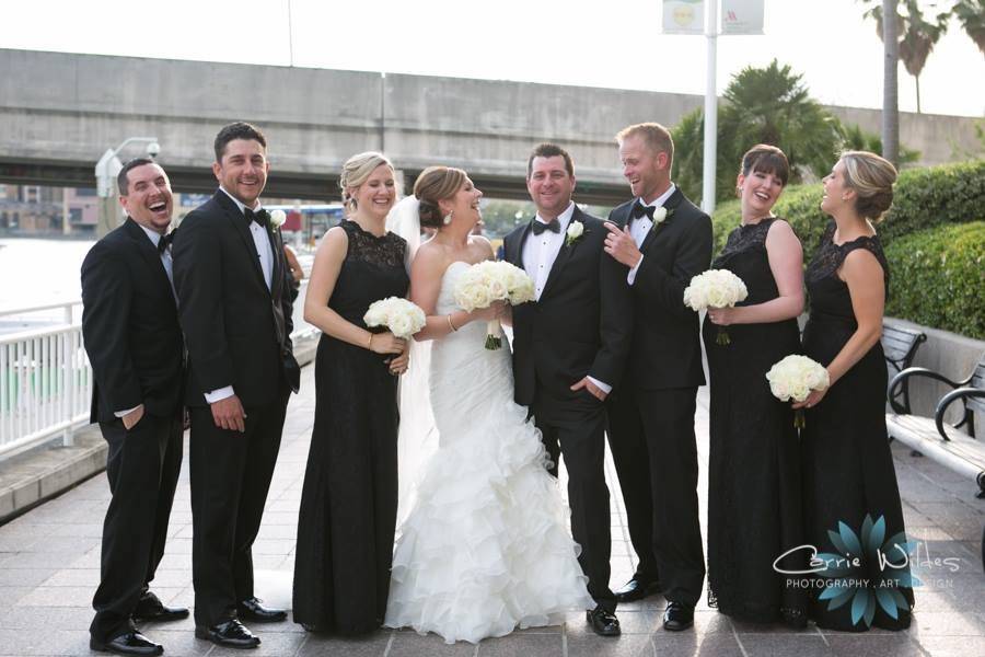 The couple with the bridesmaids and groomsmen