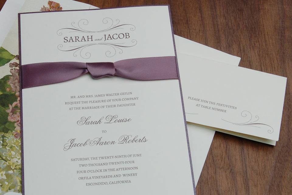 Contemporary invite with ribbon band and matching deep purple shimmer