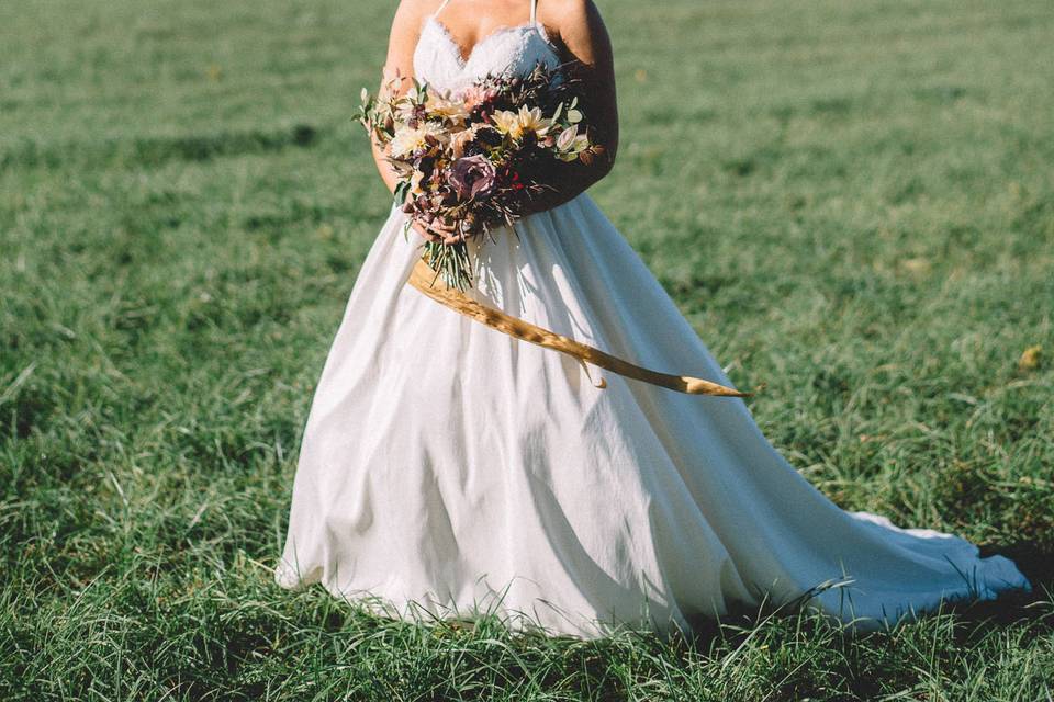 Bride in a pasture