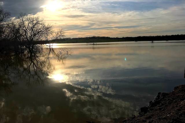 Sunrise by the water