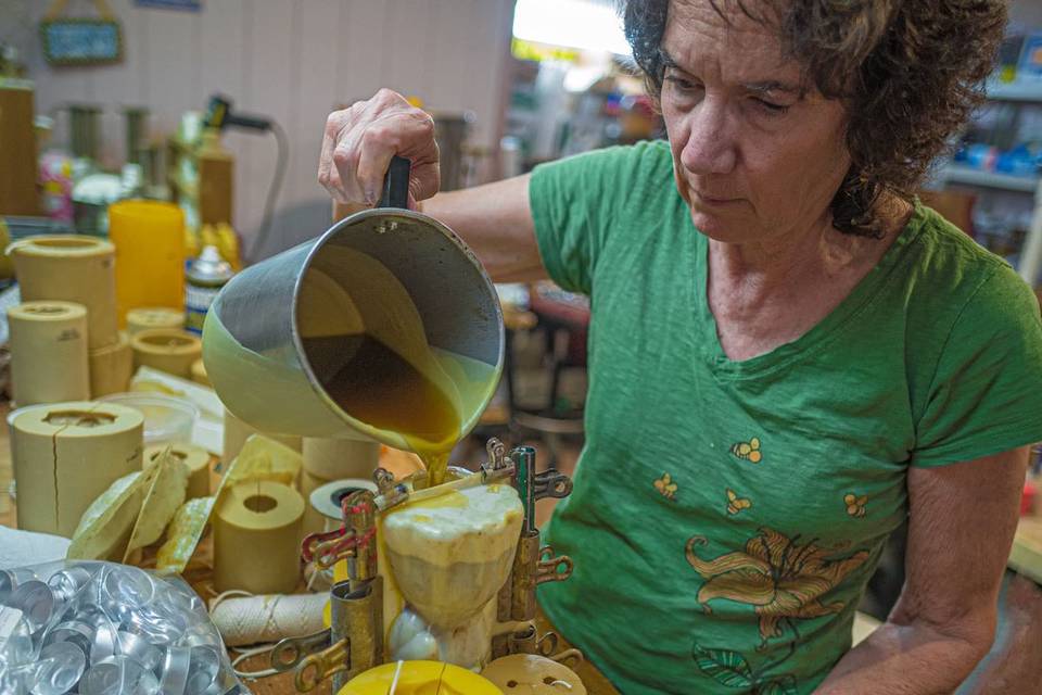 Mary pouring a Beeswax candle