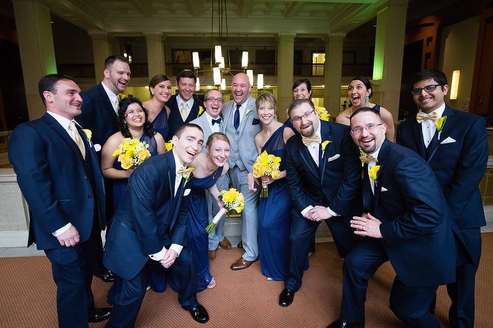 The couple with the bridesmaids and groomsmen