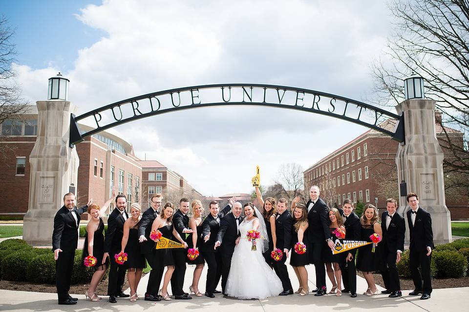 The couple with the bridesmaids and groomsmen