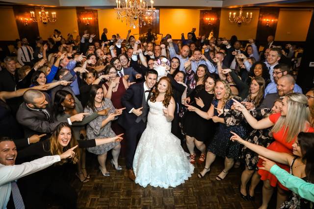 The couple surrounded by their loved ones