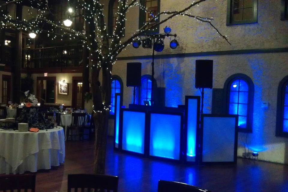 A brightly lit DJ setup