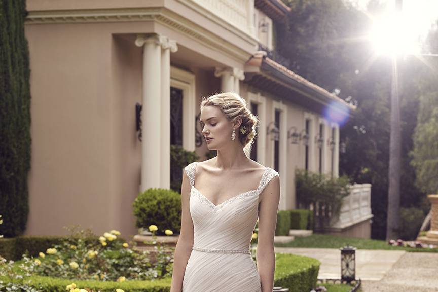 Casablanca Bridal Style 2234 - Freesia <br> Freesia’s breathtaking fit-n-flare silhouette has a bodice with light ruching that makes a flawlessly dramatic transition into the opaque tulle skirt. Exquisitely beaded tank top straps that extend from the sweetheart neckline, and a low back with a sweet detachable ribbon sash, complete the look.