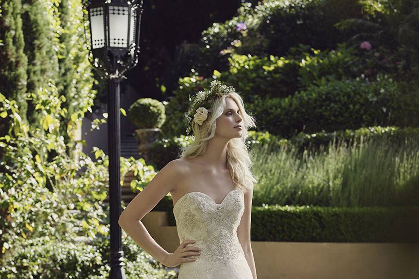 Casablanca Bridal Style 2244 - Iris <br> Iris’s fit-n-flare silhouette and sweetheart neckline feature hand beading and exposed boning on the bodice, while soft layers of scallop hem lace create a visually stunning skirt.