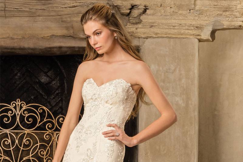 Style 2291 Everly		Embroidered lace A-line gown with a corset back and cathedral length train.