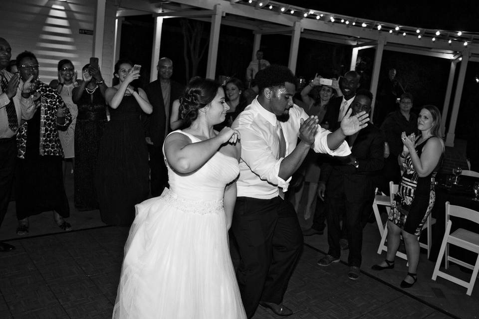 Couple and guests dancing