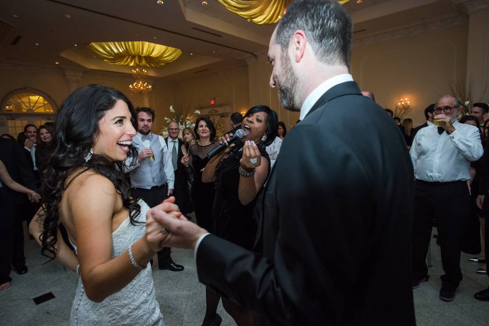 Dancing bride and groom