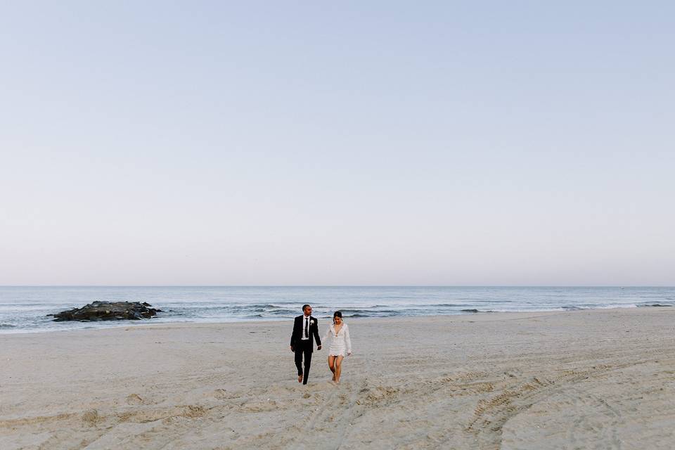 Couple Walking On Beach