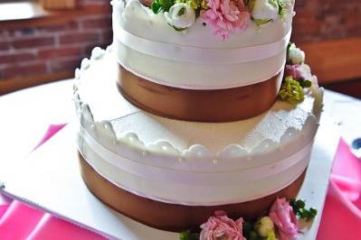 Lace fondant sides, Italian buttercream, roses, and ribbon.