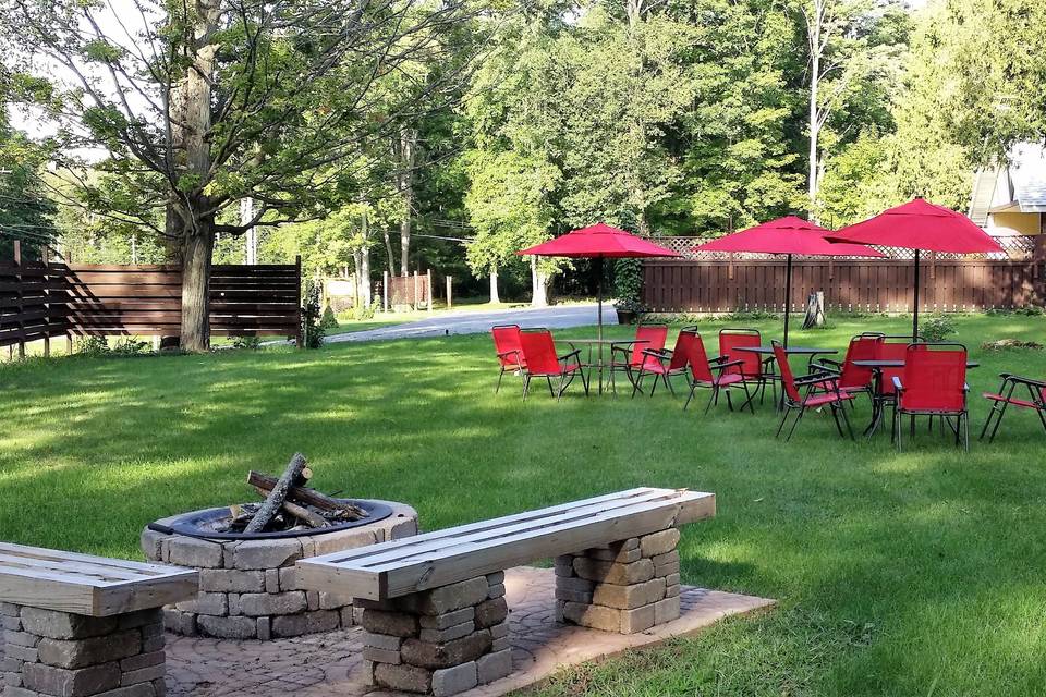 The lower lawn and fire pit area