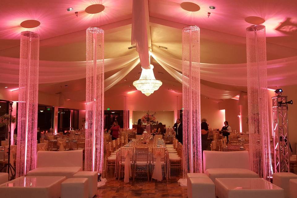 Pink uplighting in reception space