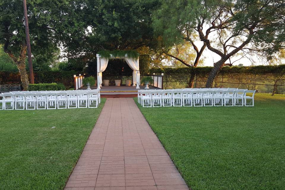 Outdoor ceremony space on the grassy lawn