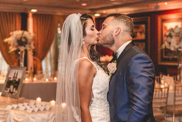 Newlyweds kissing
