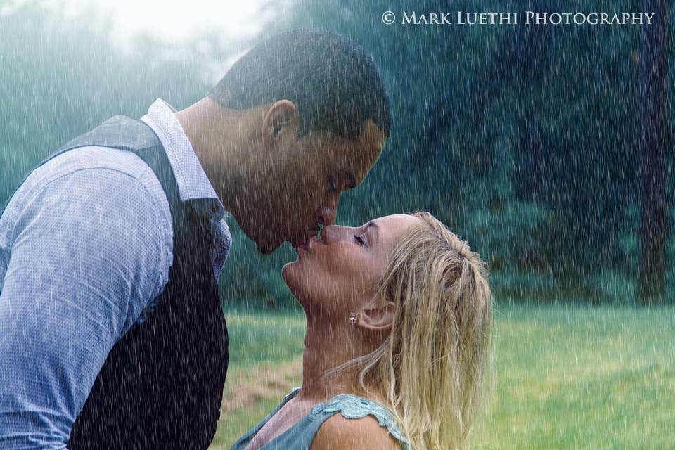 Kissing in the Rain - Engagement Portrait