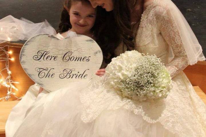 The bride with flower girl